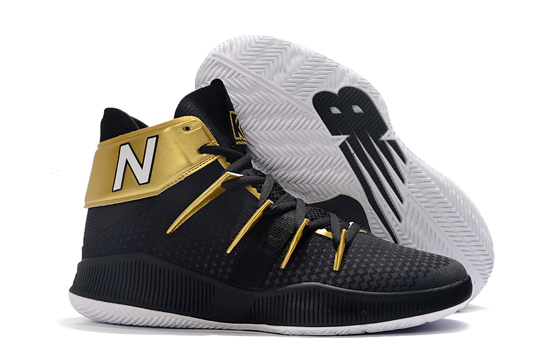 new balance black and gold sneakers