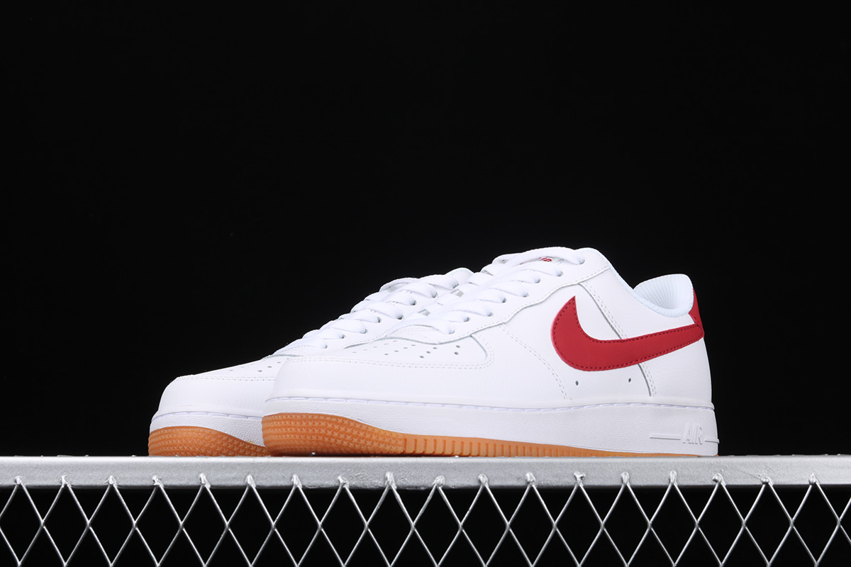 nike air force 1 trainers with red swoosh and gum sole