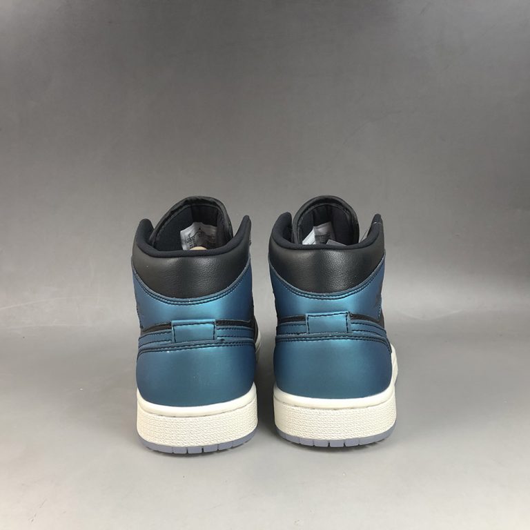black and turquoise jordans 1