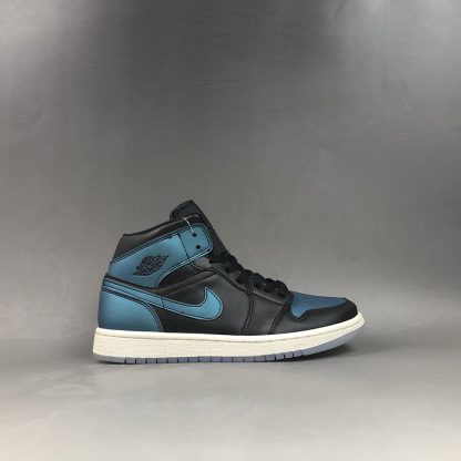 black and turquoise jordans