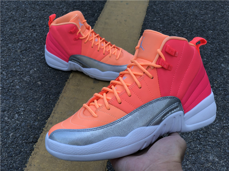 pink and white jordan 12