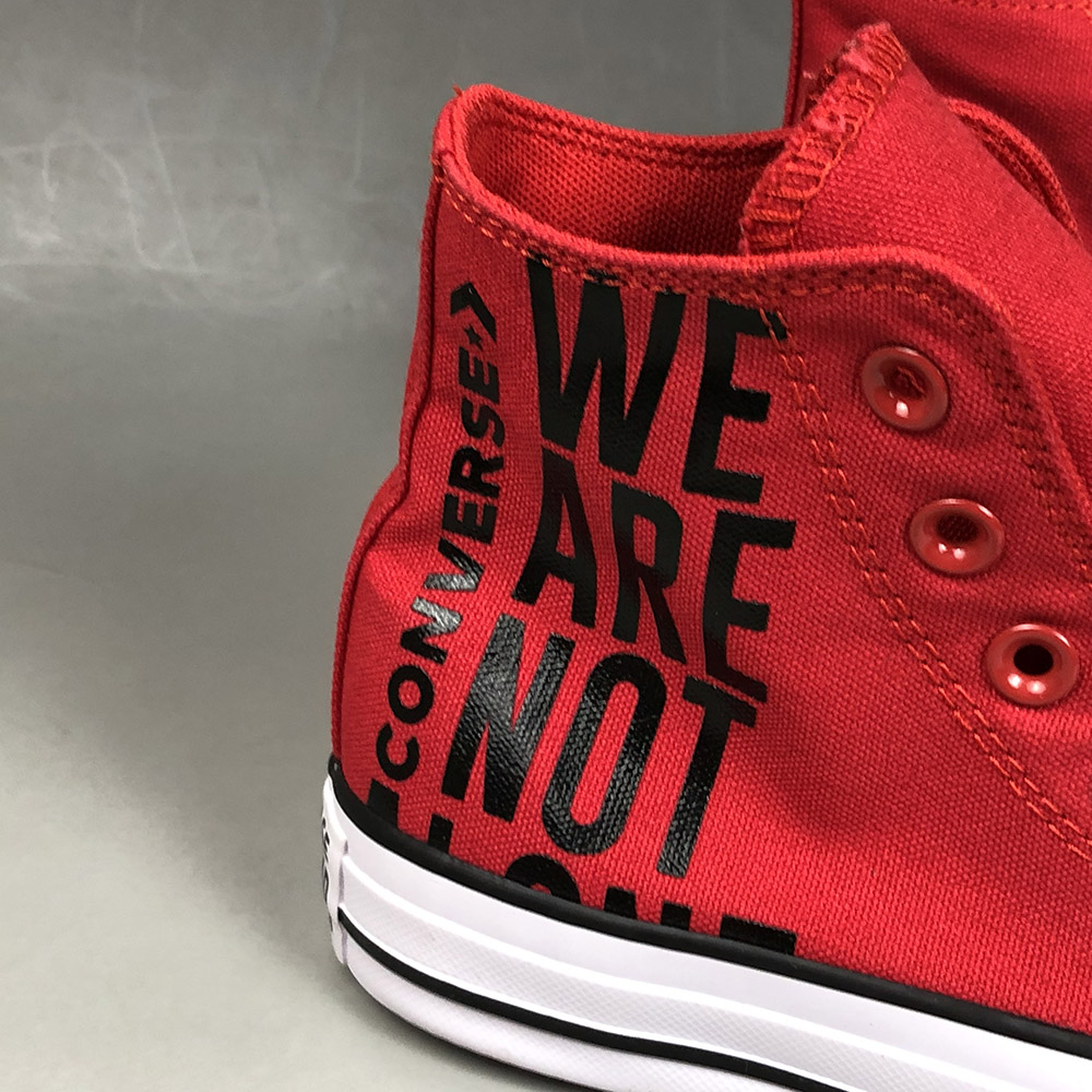 converse we are not alone red