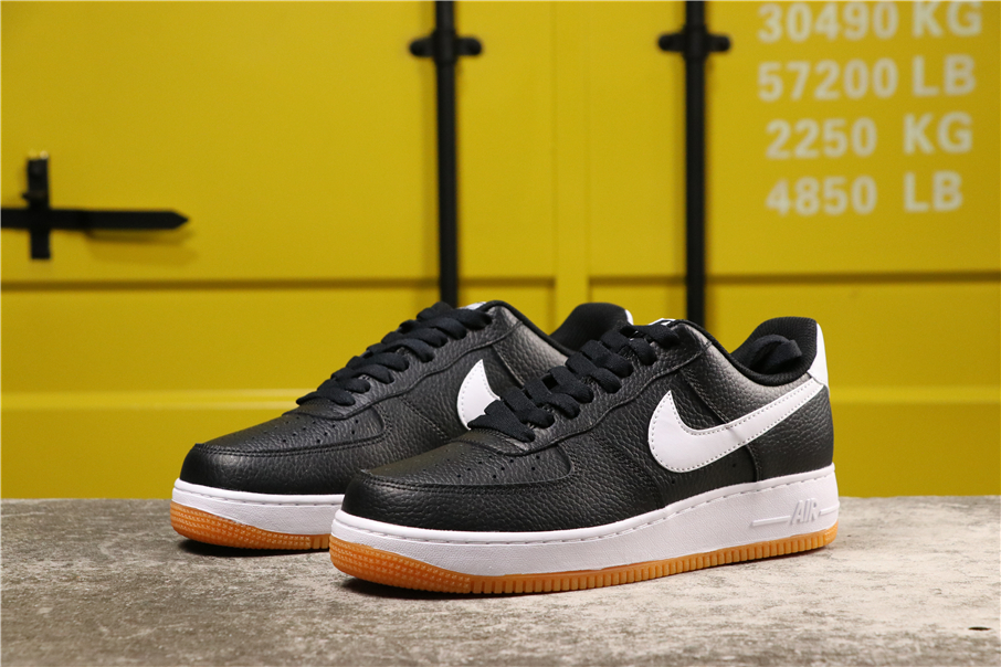 nike air force 1 sneakers with navy swoosh and gum sole