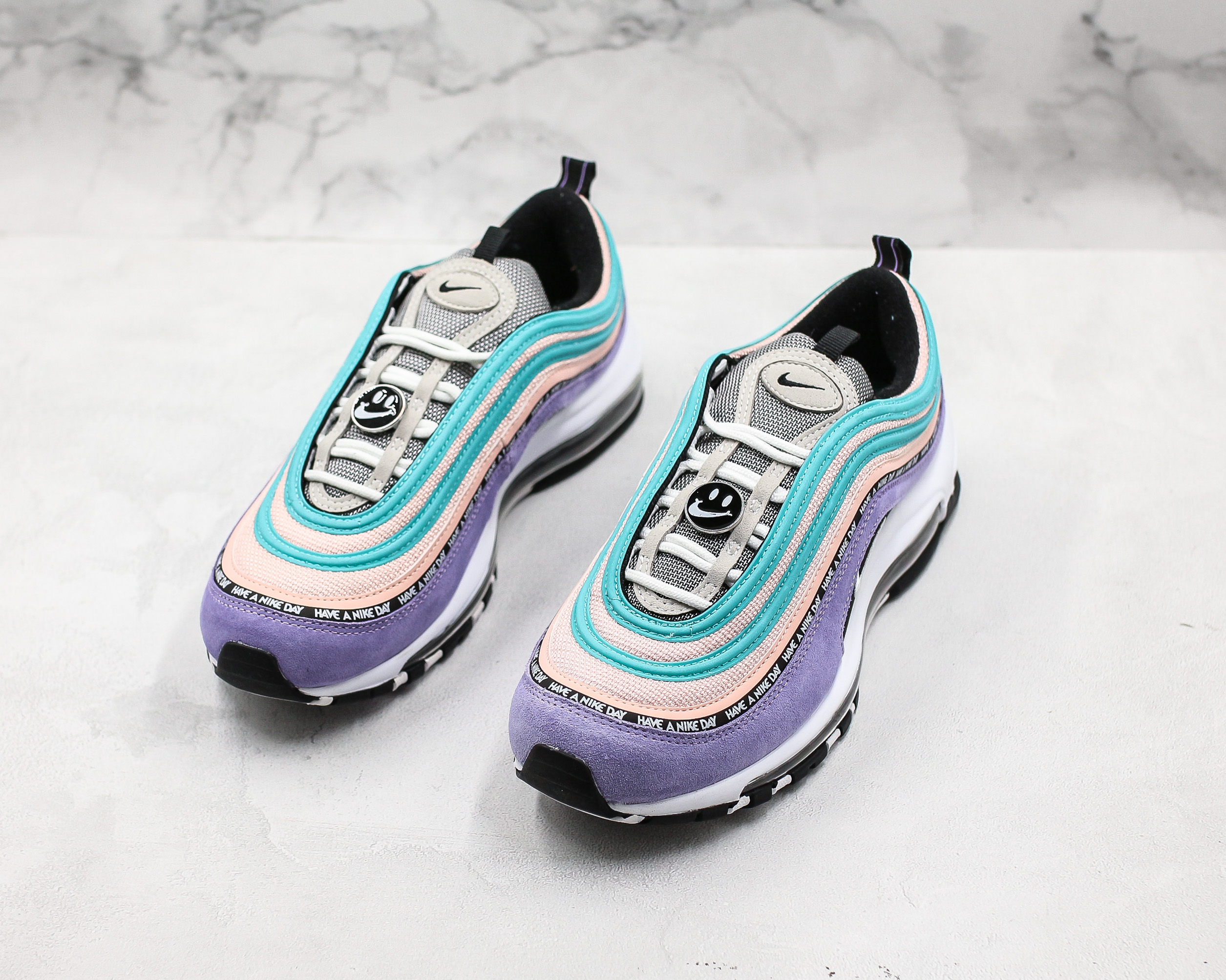 purple white and teal air max 97