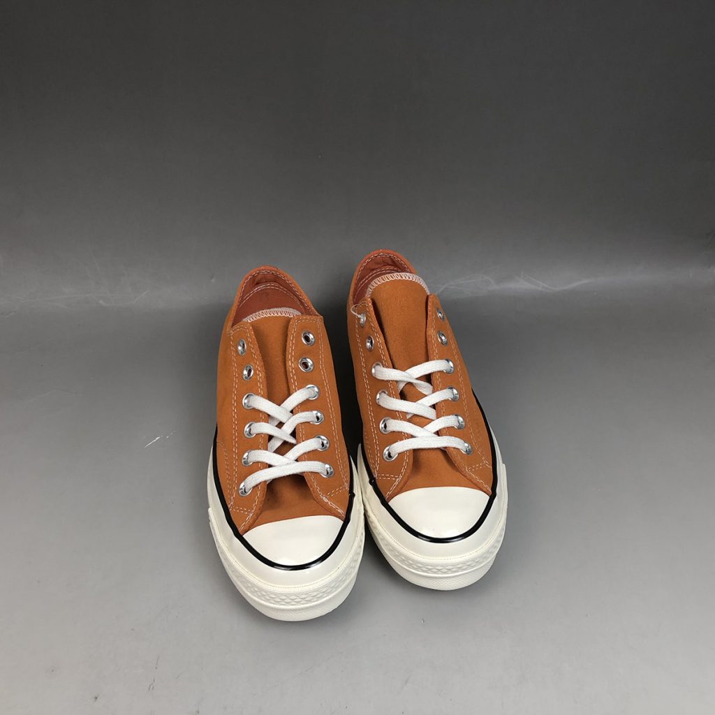 orange and black chucks
