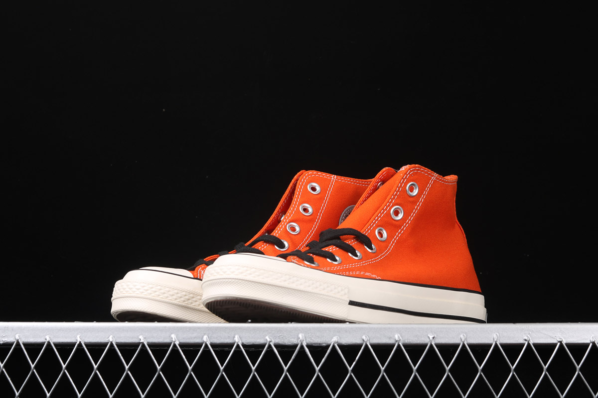 black and orange converse