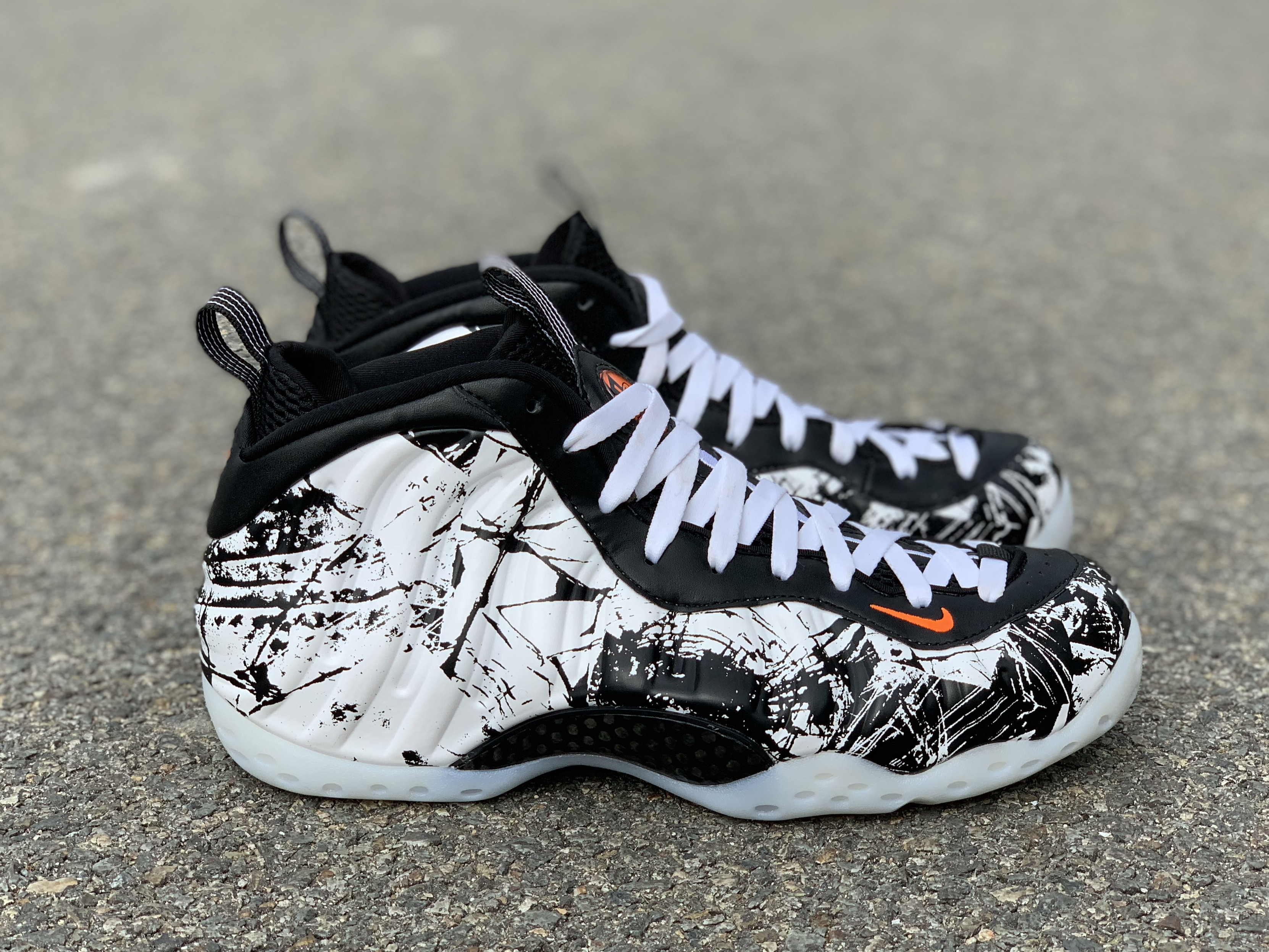 black and white foamposites mens