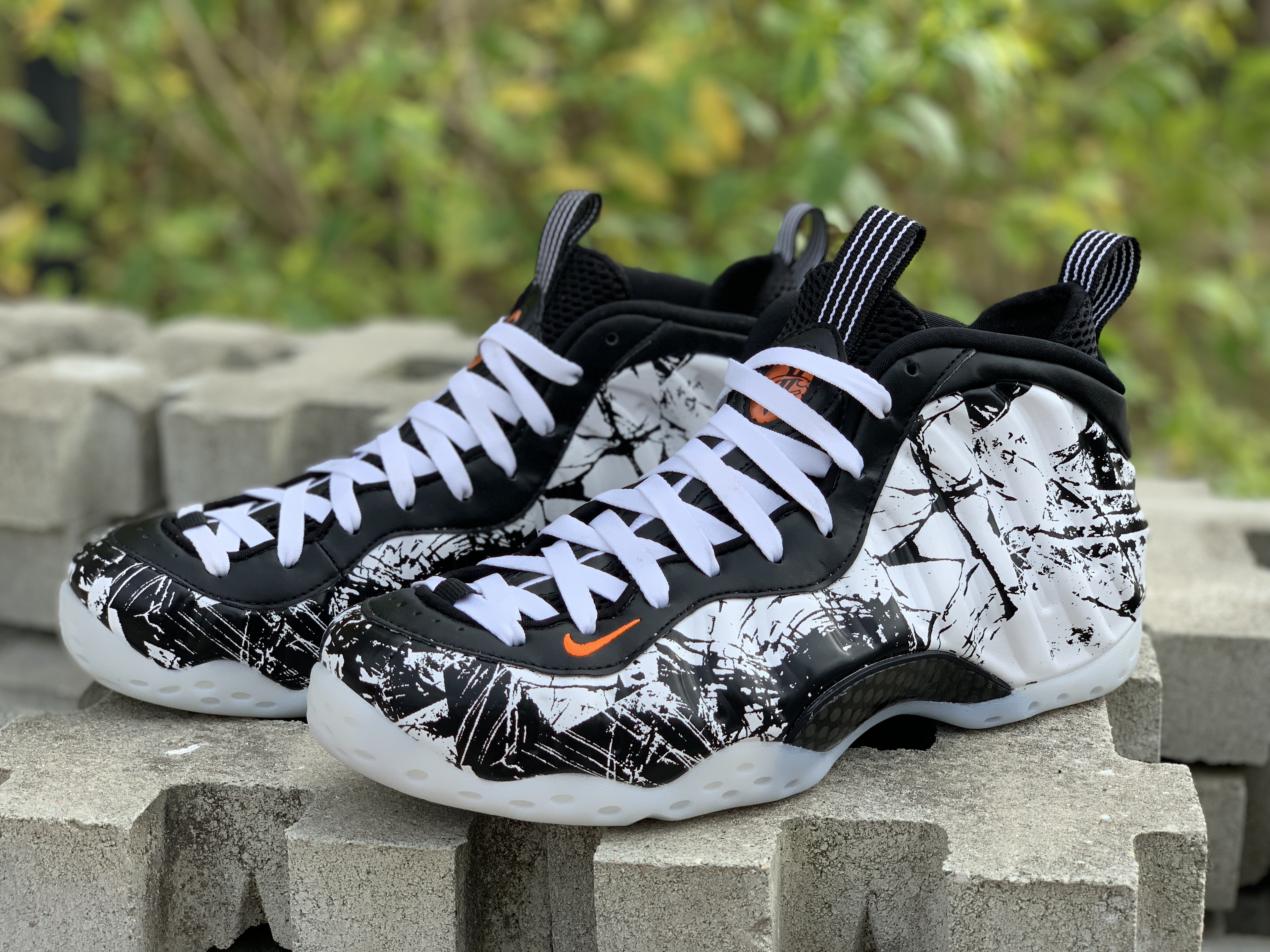 nike air foamposite one black white total orange