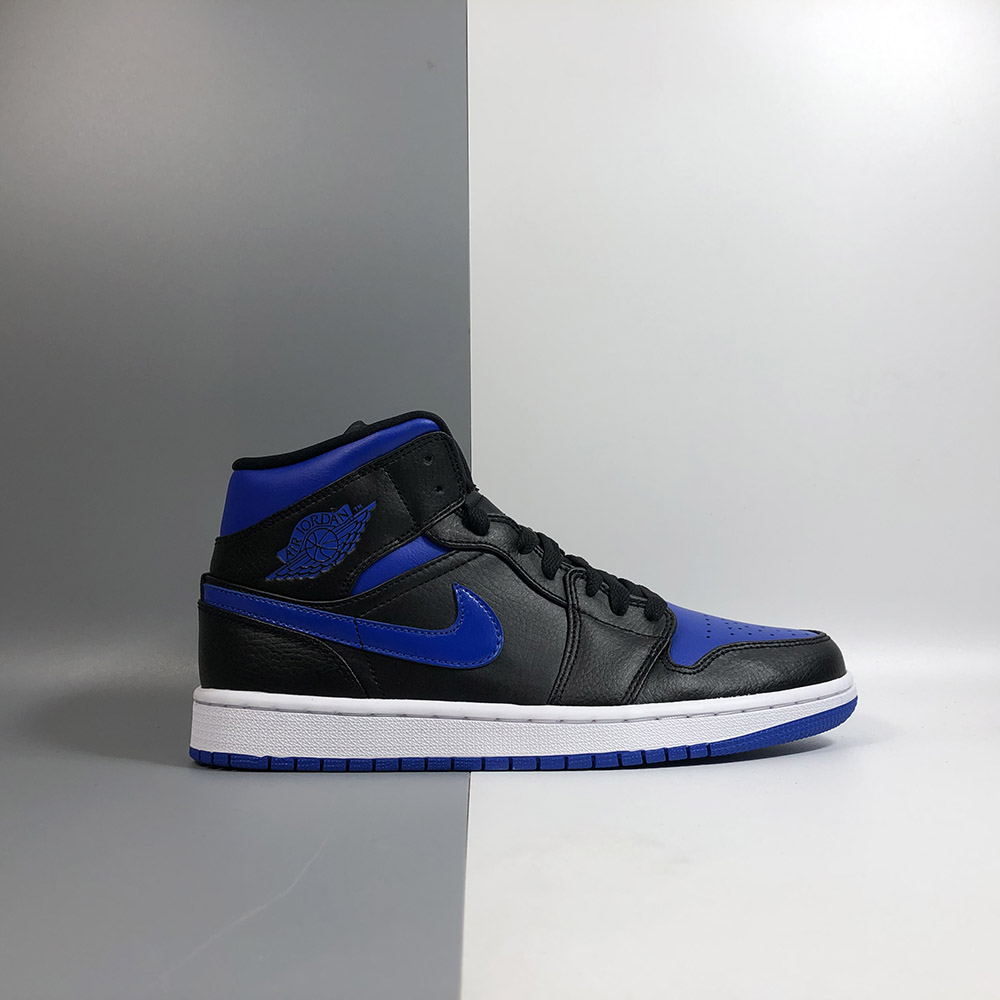 black and blue jordan mid 1