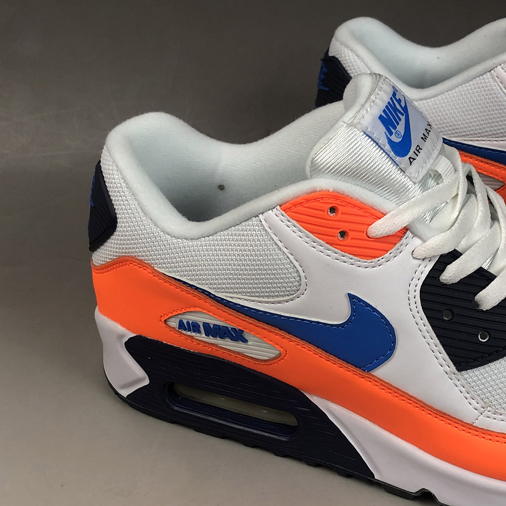 orange and navy blue nike shoes