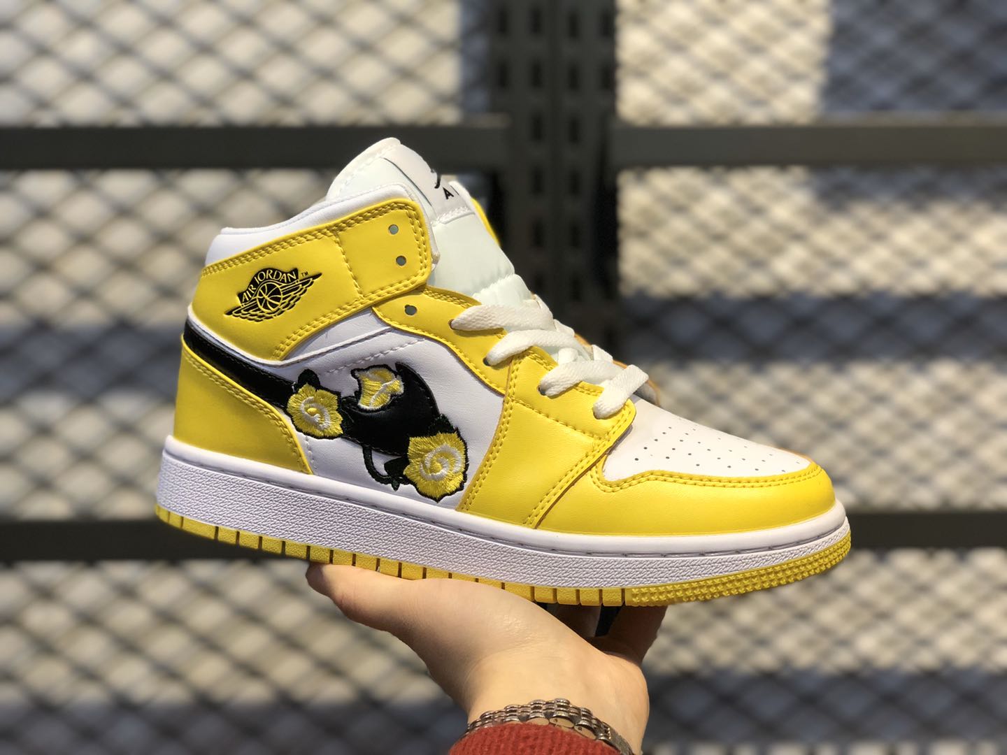 air jordan 1 mid with yellow floral embroidery