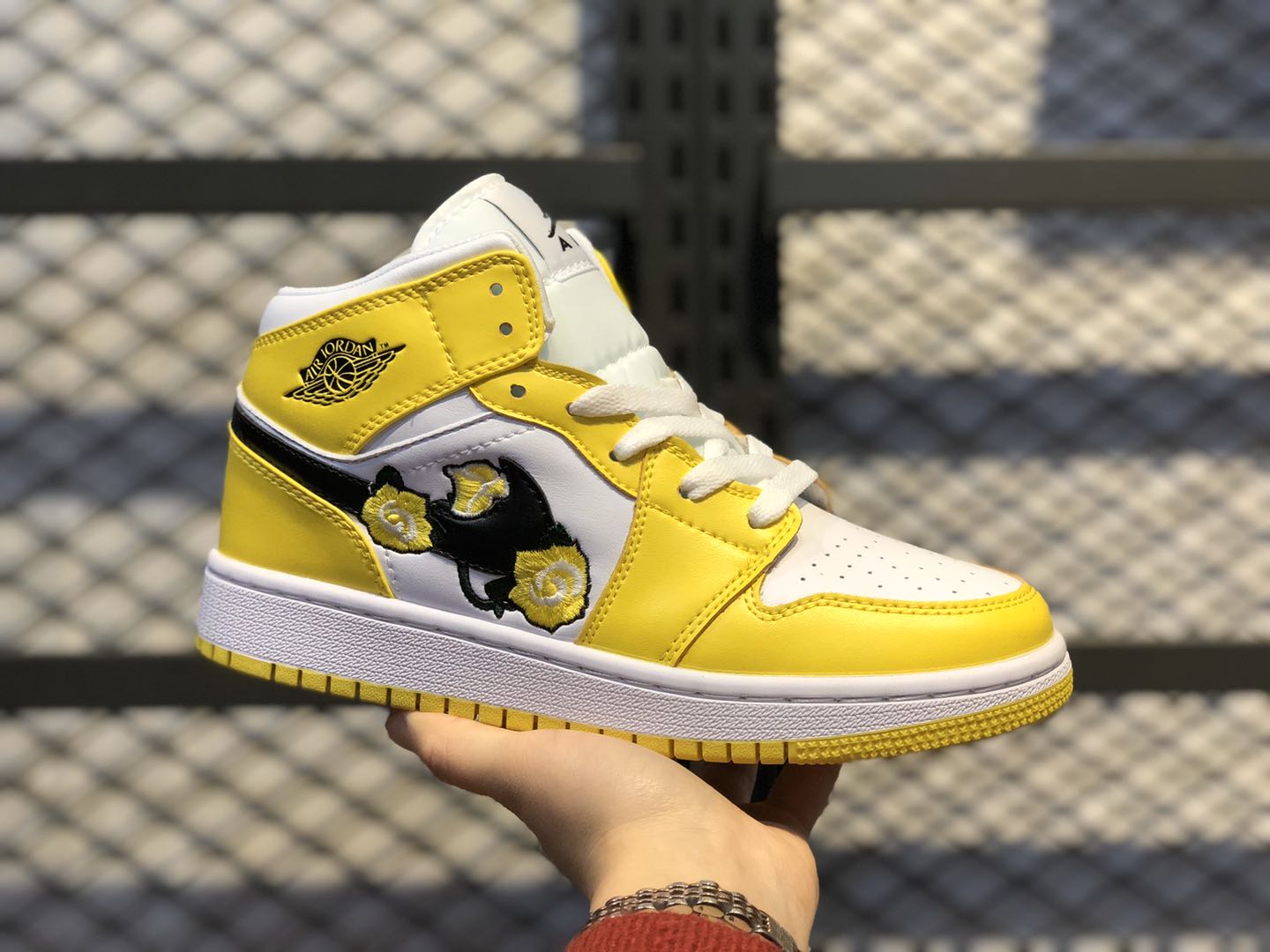 white and yellow jordan 1 with flowers