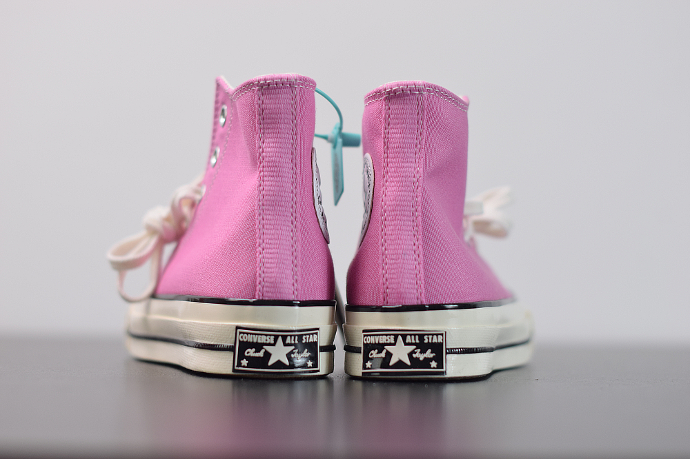 black and pink converse high tops