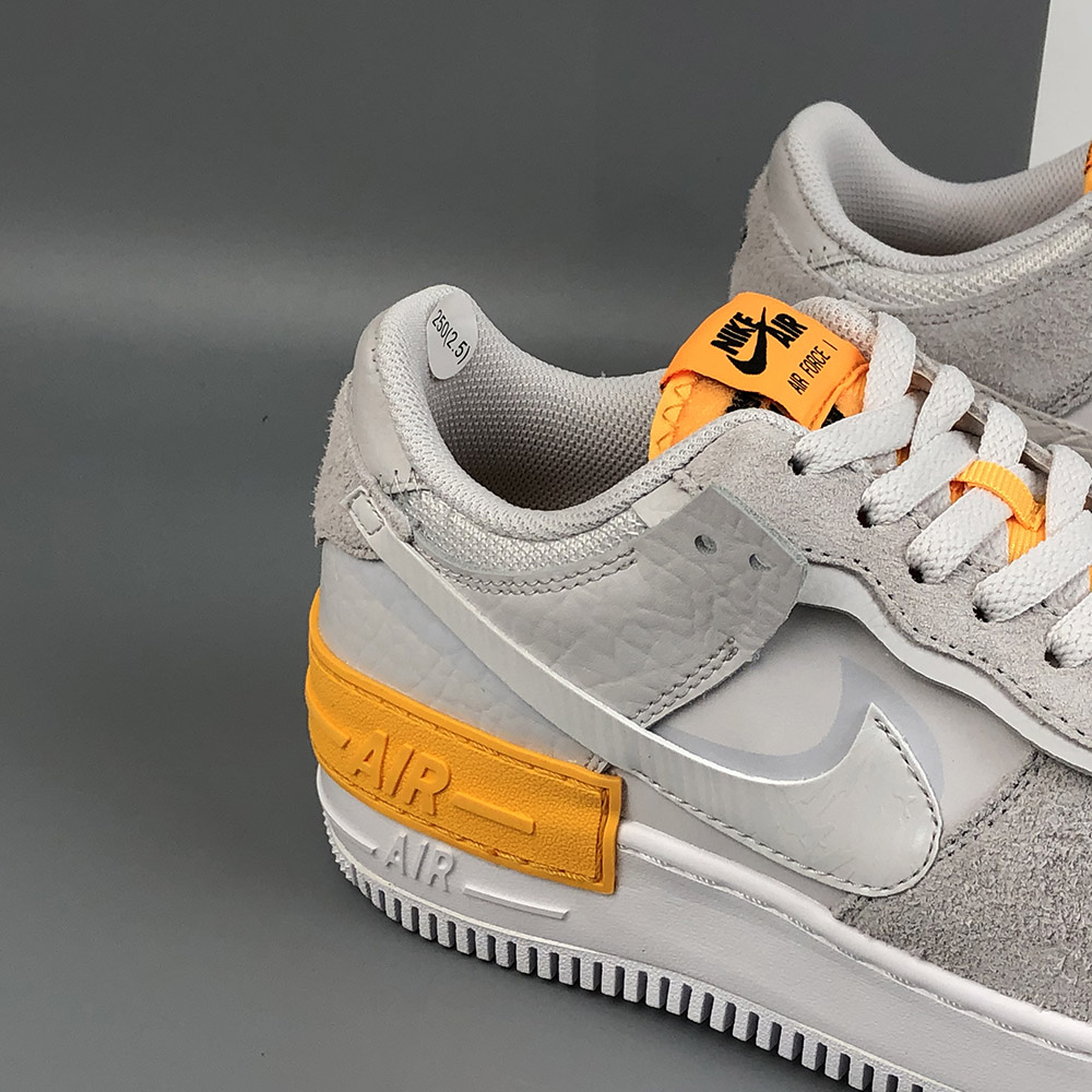 grey and orange air force ones