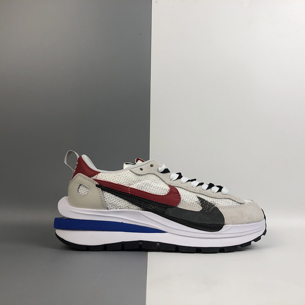 nike sacai vaporwaffle fuchsia