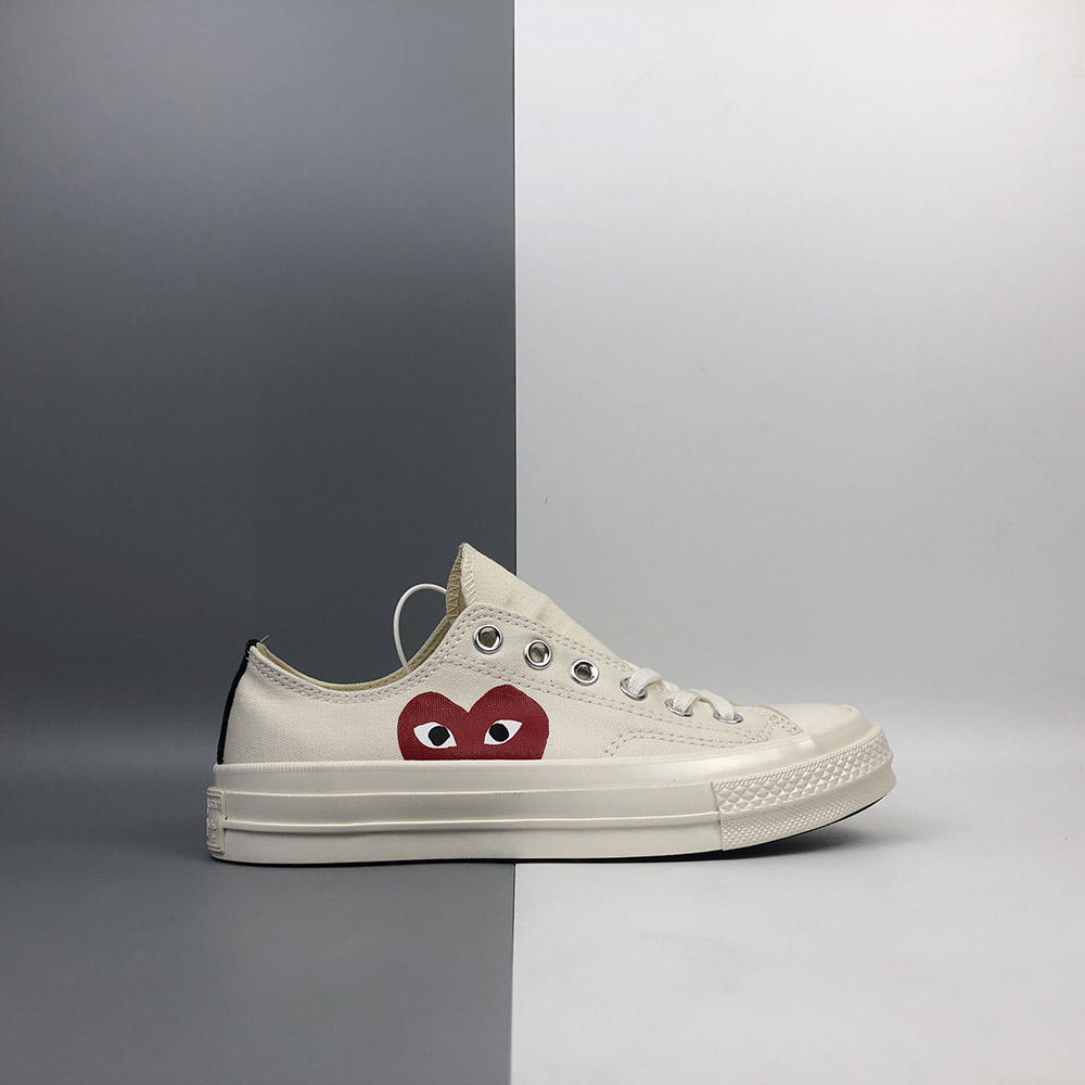 cdg low top converse white