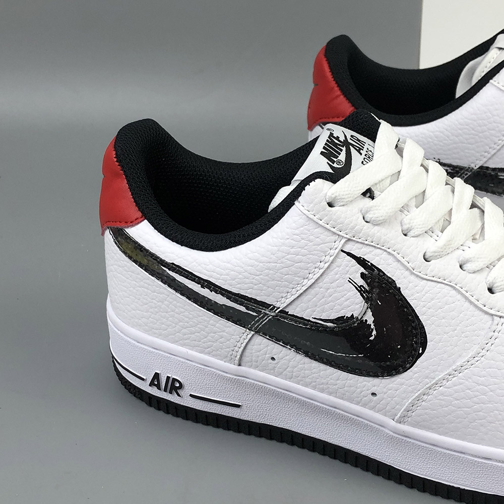 white nikes with red swoosh