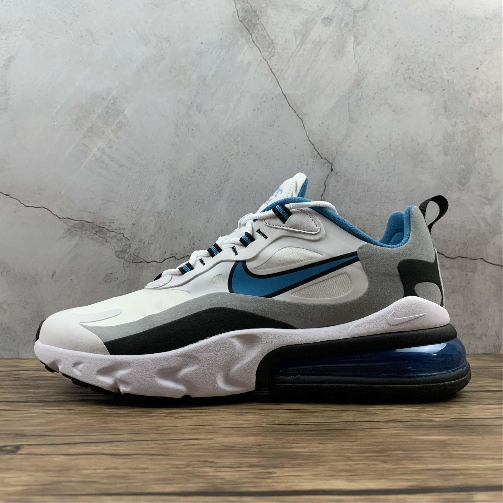 gray and blue air max