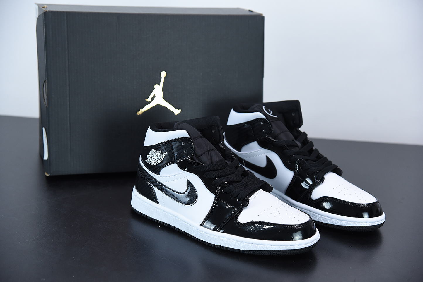 black and white jordan air forces