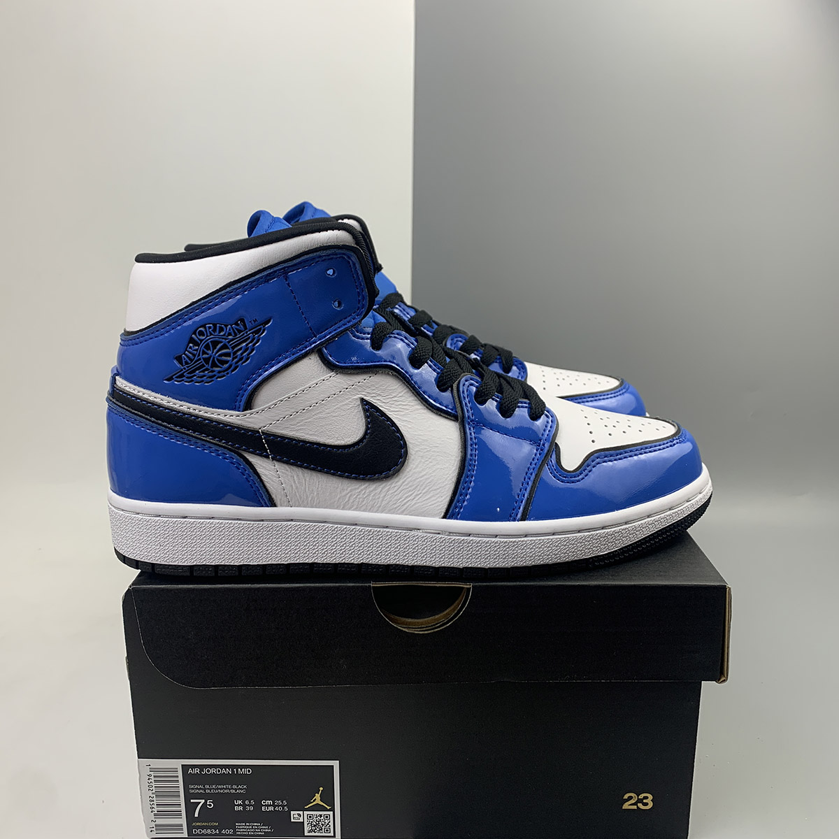 jordan 1 signal blue mid