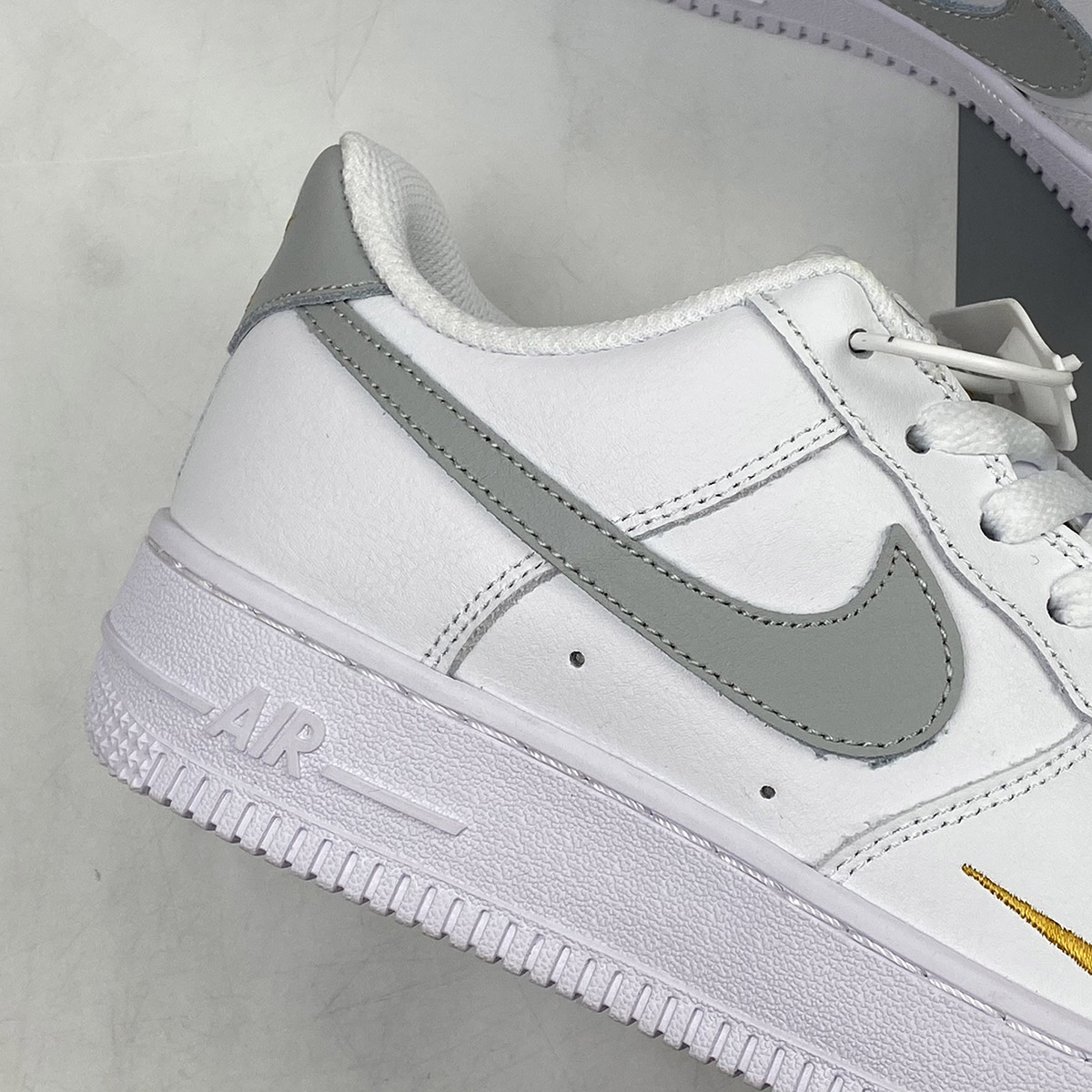 Nike-Air-Force-1-Low-White-With-Gold-Mini-Swooshes-2