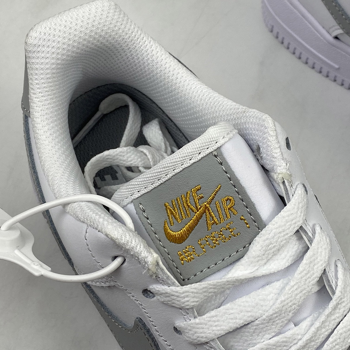 Nike-Air-Force-1-Low-White-With-Gold-Mini-Swooshes-3