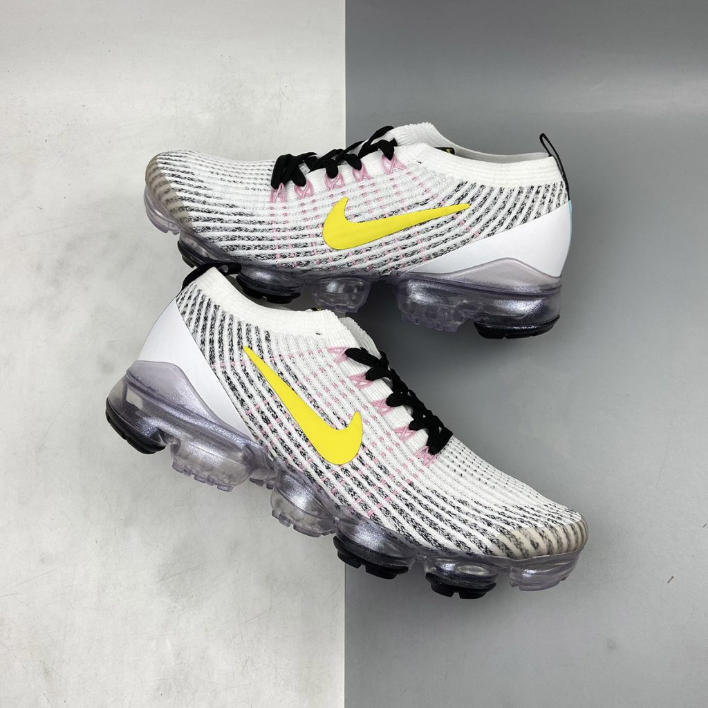 white and turquoise vapormax
