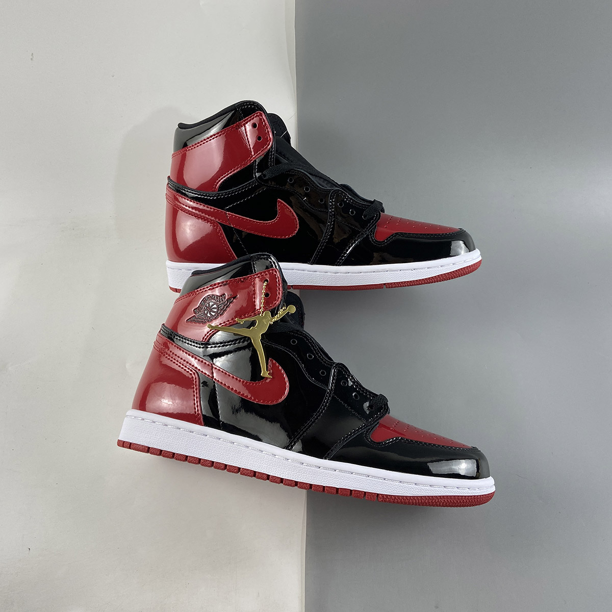 Air-Jordan-1-High-OG-Bred-Patent-Black-White-Varsity-Red-For-Sale-1