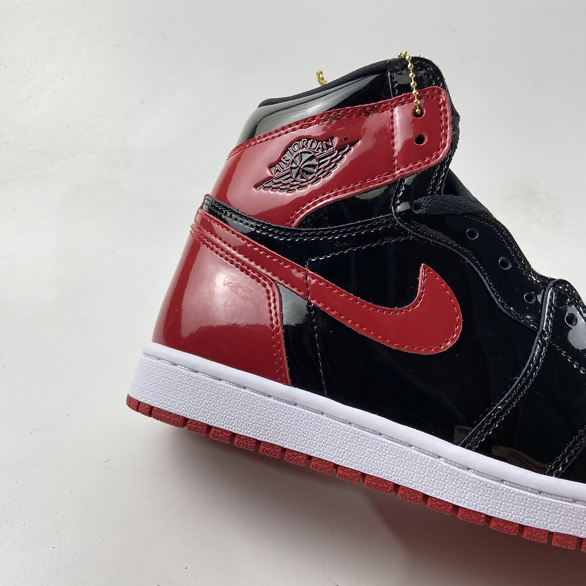 Air-Jordan-1-High-OG-Bred-Patent-Black-White-Varsity-Red-For-Sale-2