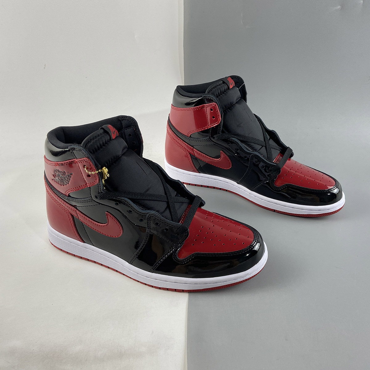 Air-Jordan-1-High-OG-Bred-Patent-Black-White-Varsity-Red-For-Sale-6
