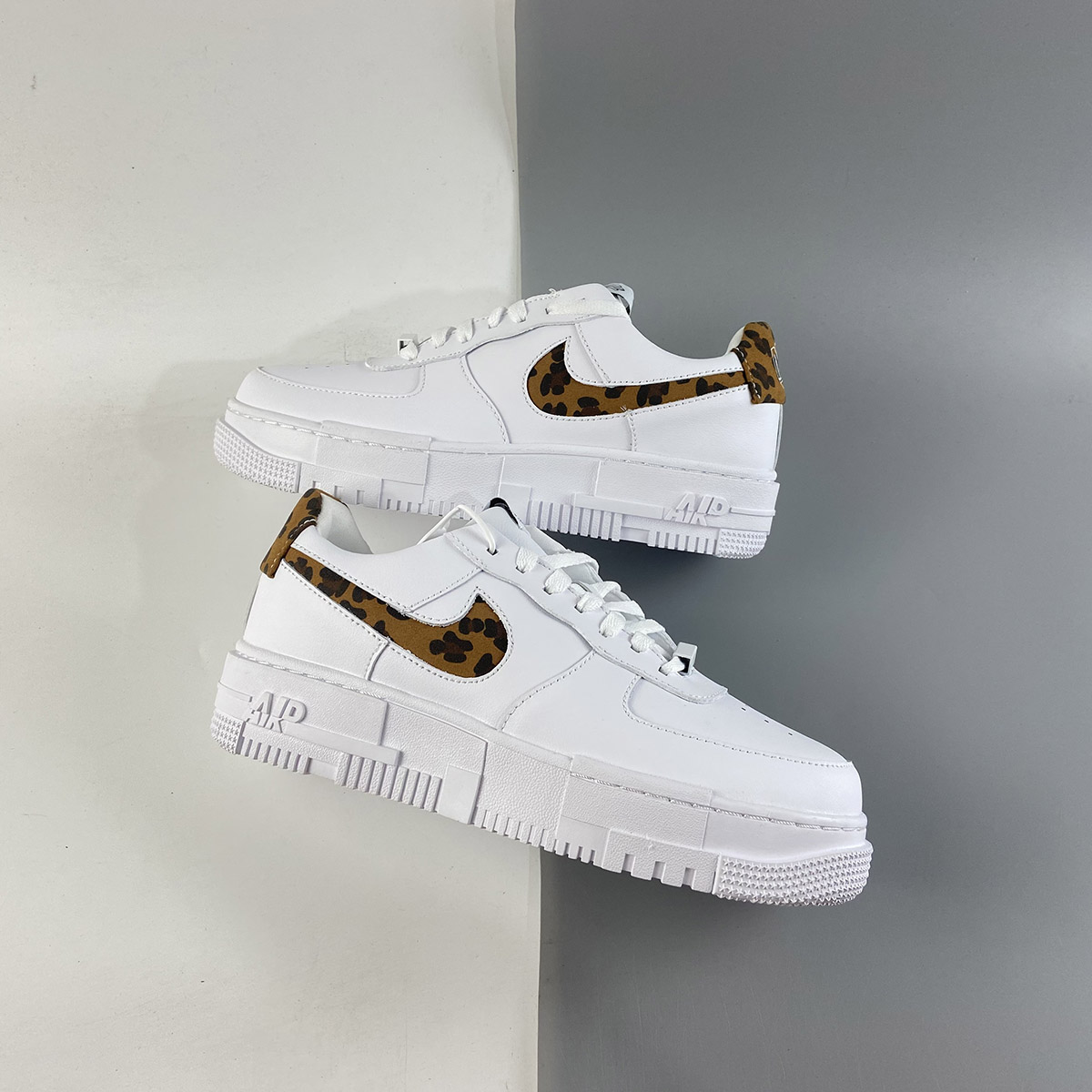 air force 1 pixel trainerswhite leopard