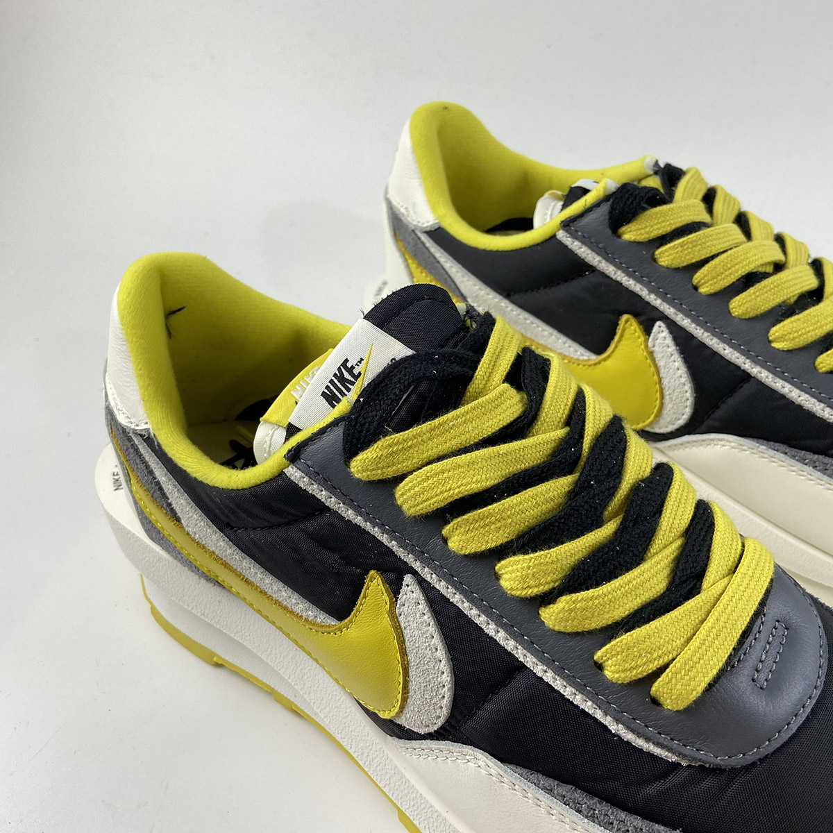 sacai undercover black bright citron