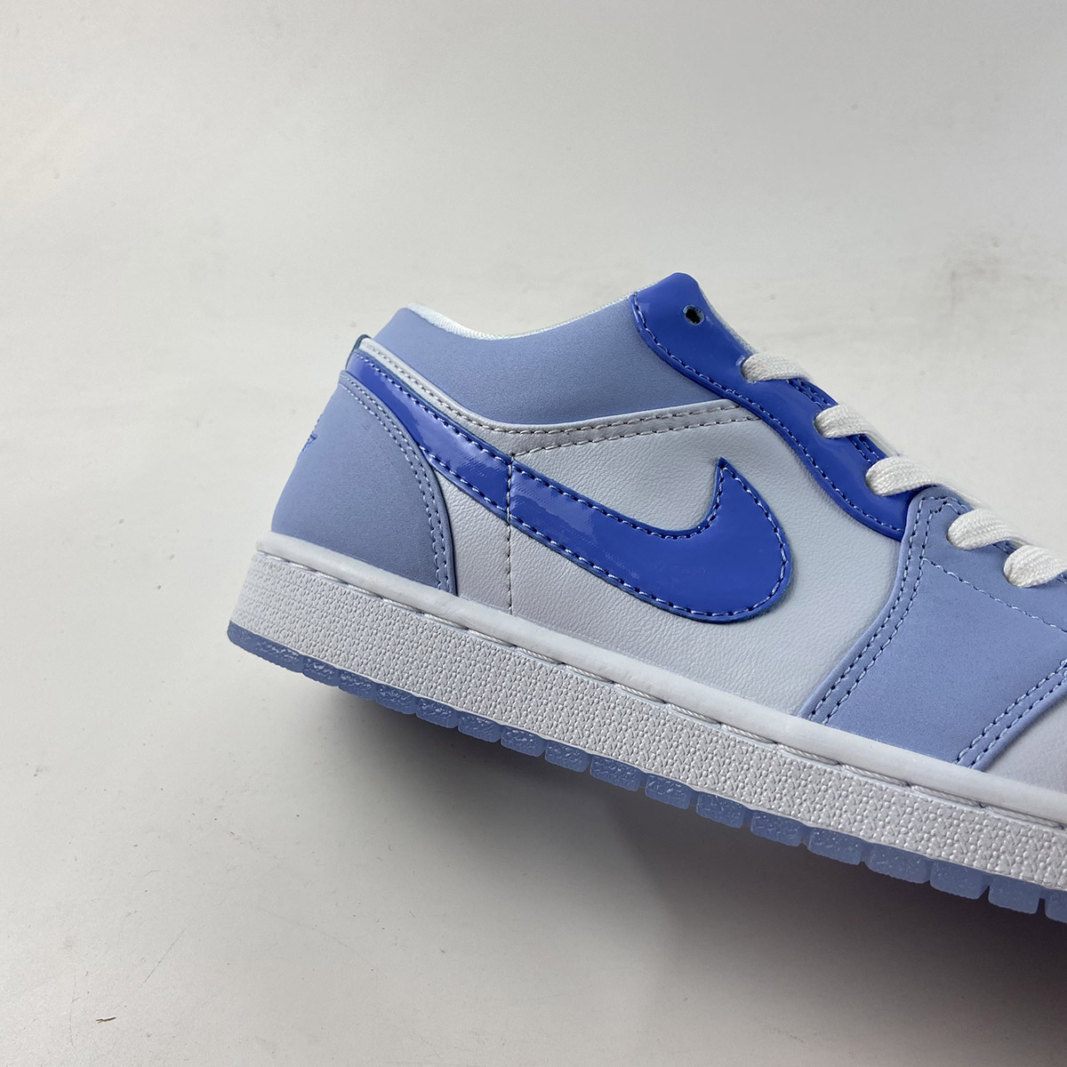 Air-Jordan-1-Low-The-Mighty-Swooshers-Blue-White-For-Sale-2