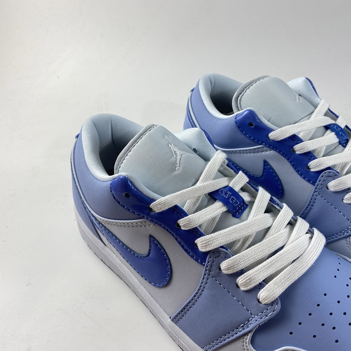 Air-Jordan-1-Low-The-Mighty-Swooshers-Blue-White-For-Sale-3